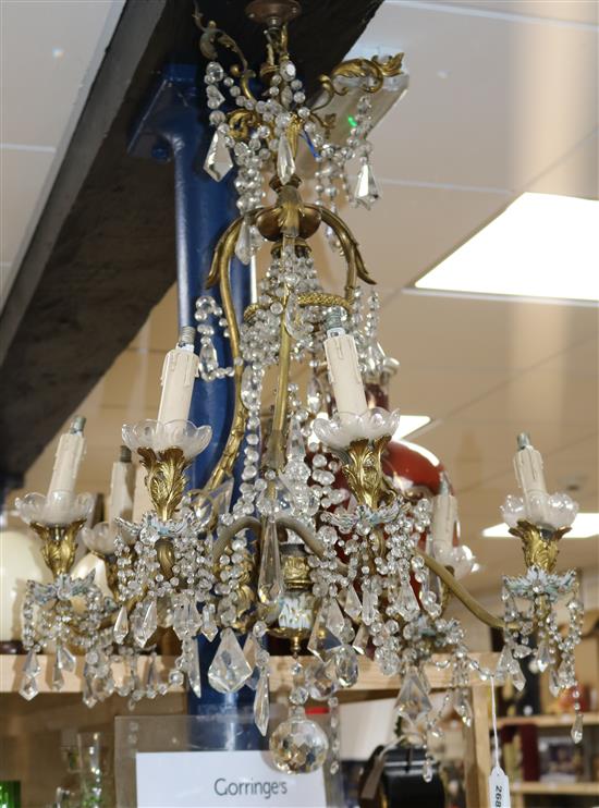 A French gilt metal, porcelain and glass chandelier